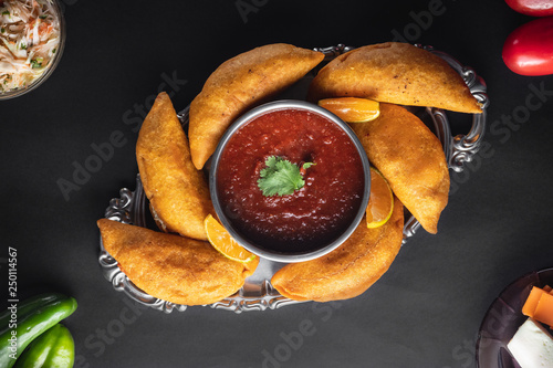 Canvas-taulu Honduran pastelito de perro is a street food
