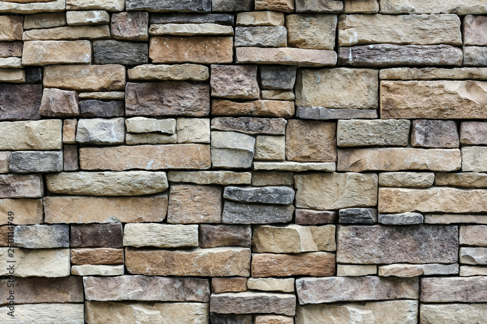 the stone wall texture background natural color.Background of stone wall texture photo.Natural stone wall texture for background.Old Brick  texture, Grunge brick wall background.
