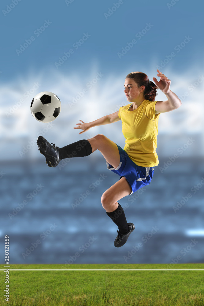 Fototapeta premium Young Woman Playing Soccer