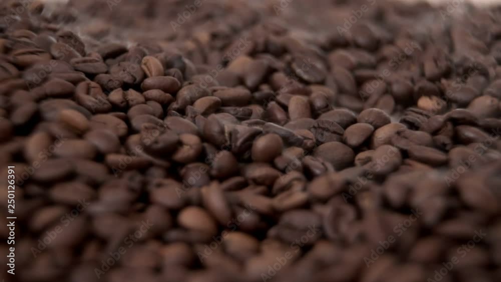 easy fragrant smoke swirls over a bunch of beautiful coffee bean easy fragrant smoke swirls over a bunch of beautiful coffee bean