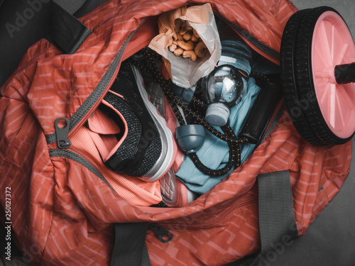 Sports bag and gym equipment with health snack nuts