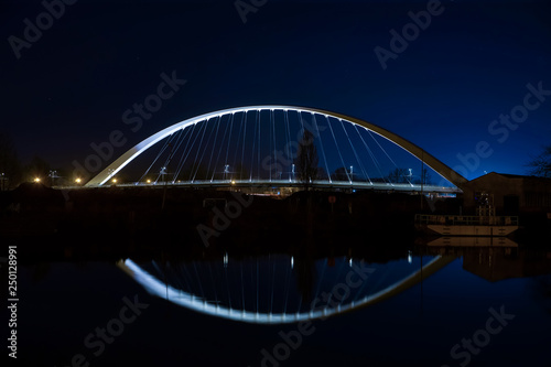 Citadelle Bridge across Bassin Vauban for trams and bicycles. Night view. © 31etc