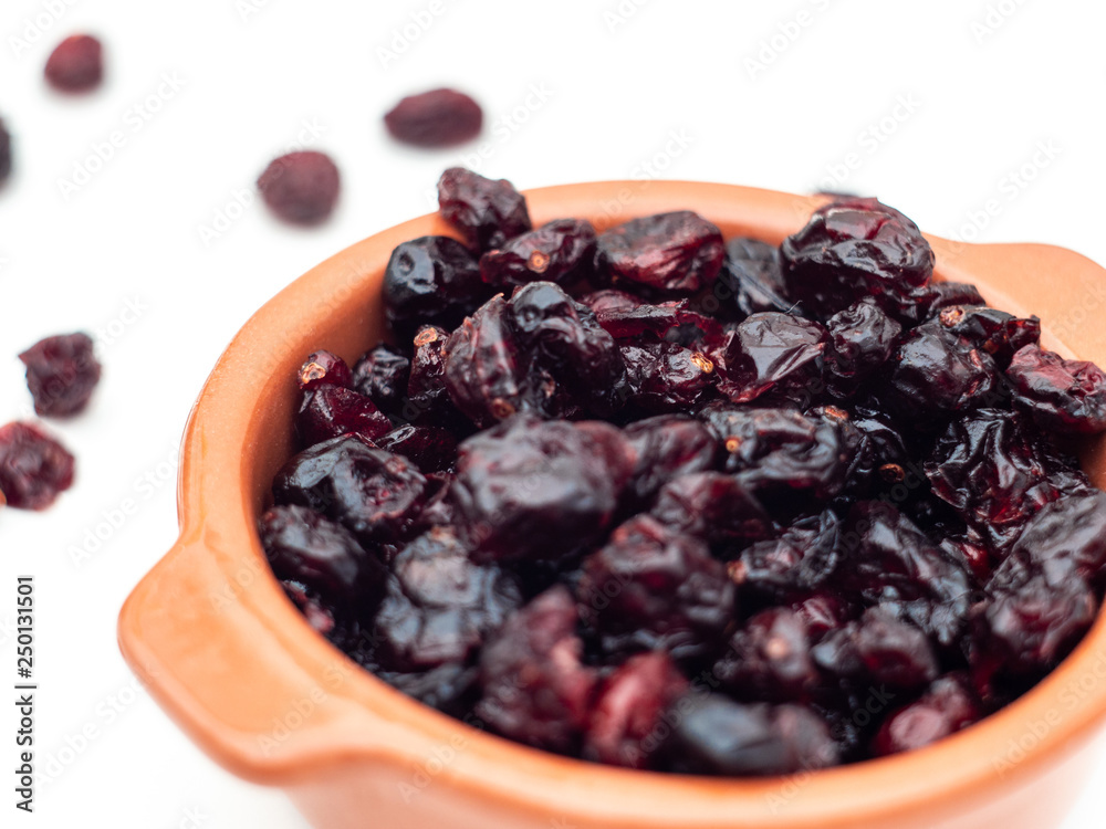 Healthy eating: Top view of cranberries in a ceramic bowl Healthy eating: Top view of cranberries in a ceramic bowl