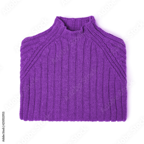 Colored wool neatly folded sweater on a white background. © YuryGulakov