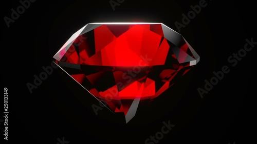 Realistic ruby gemstone isolated on black background.