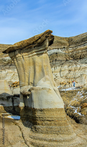 Hoodoos show the wear and tear from erosion and rain in the badlands, Drumheller, Alberta, Canada photo