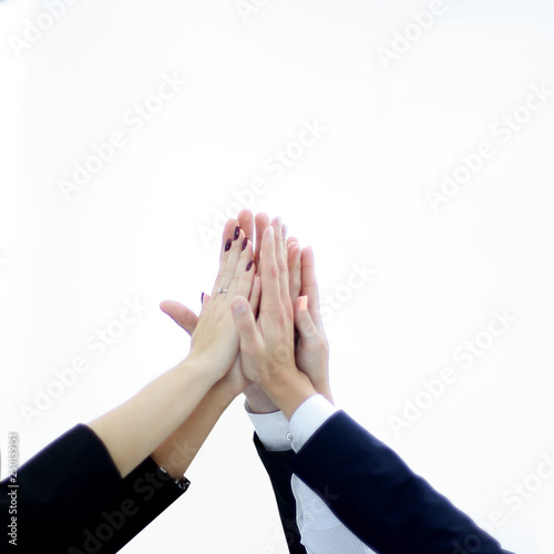 close up. business team giving each other a high five