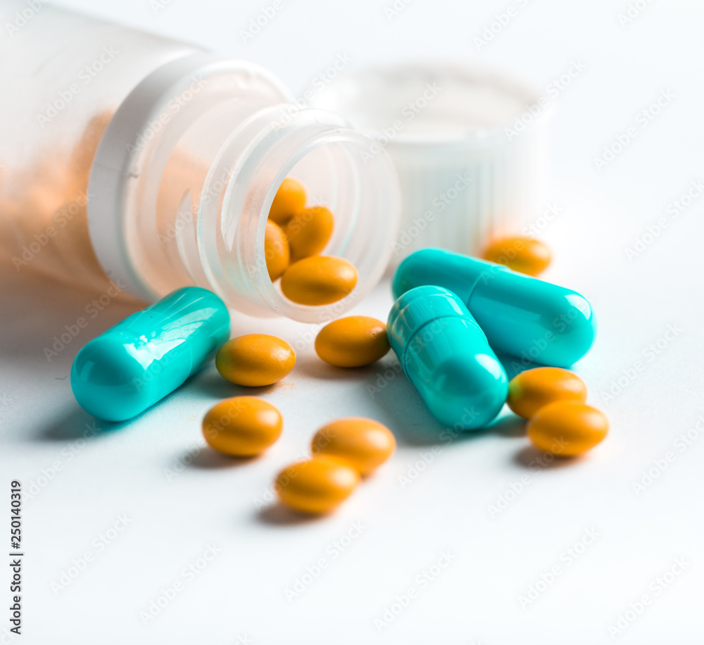 Assorted pharmaceutical medicine pills, tablets and capsules.Pills background. Assorted pharmaceutical medicine pills, tablets and capsules.Pills background.