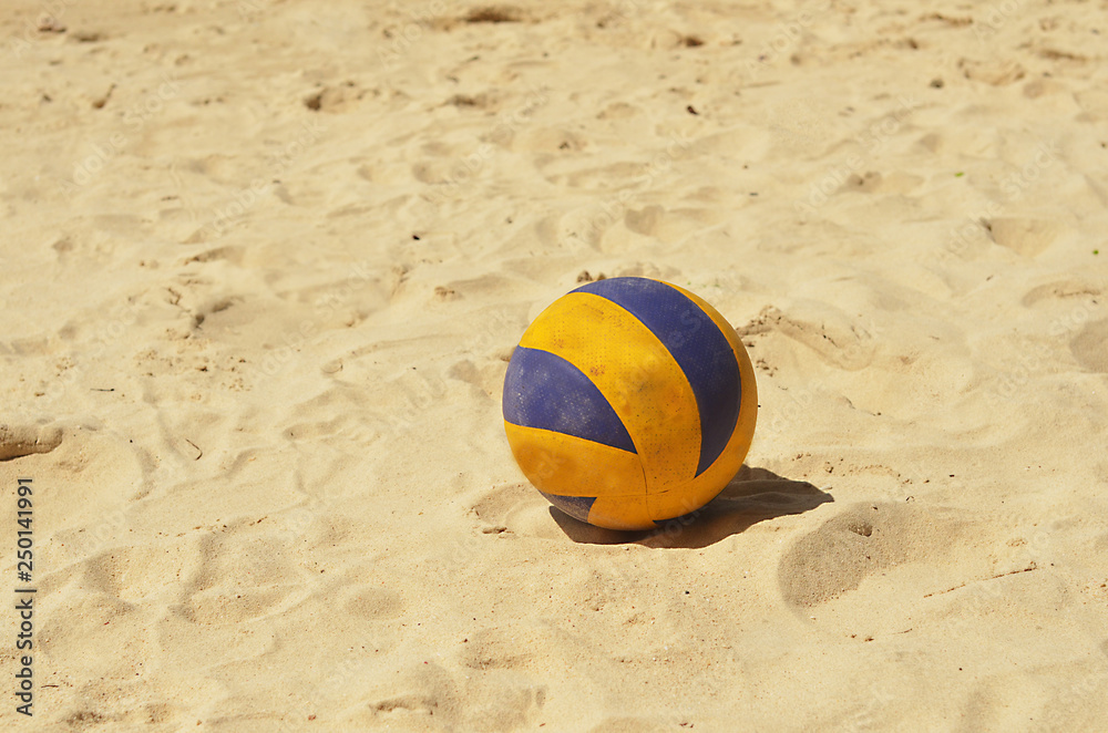 Volleyball on the beach sand photo