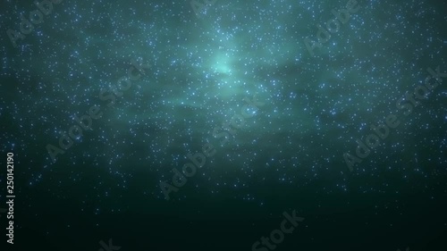 Animation (looped) of underwater shooting of floating glowing plankton.