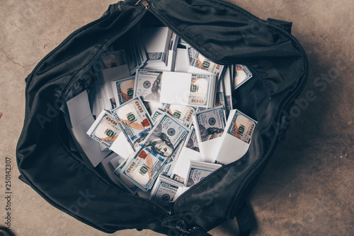 Black bag full of money photo