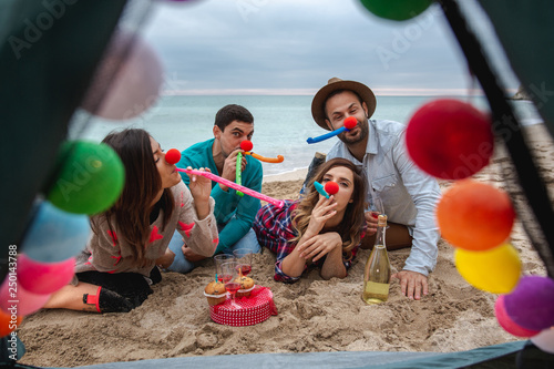 Happy People. New Year's Party at the beach photo