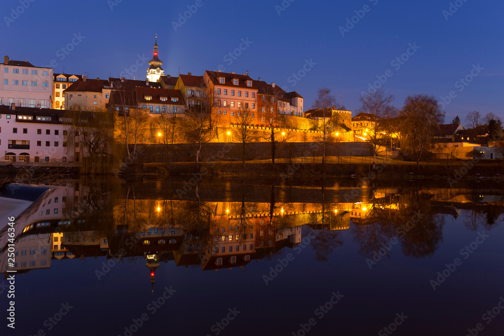 Night winter royal medieval Town Pisek with the Castle above the river Otava, Czech Republic 