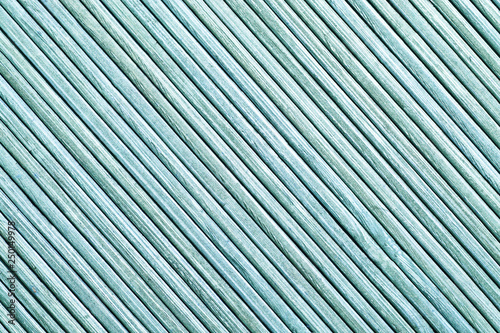 Striped wooden lines pattern. Grunge blue paint wood backdrop.