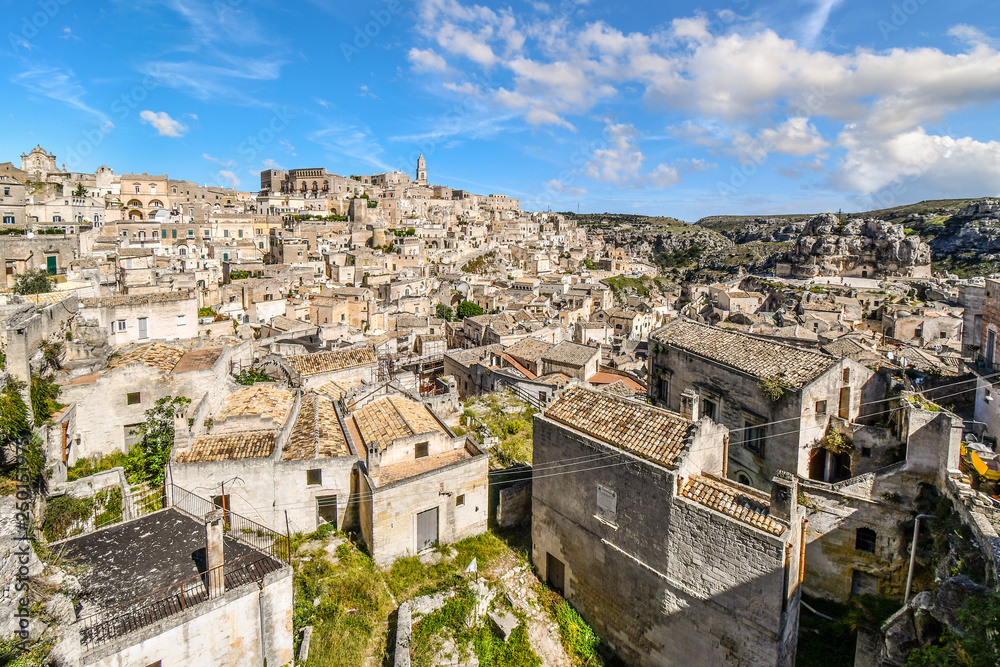 The ancient sassi di Matera caves, the Rock Church and medieval Sasso Barisano and village in the city of Matera, Italy, in the Basilicata region of Southern Italy, an Unesco World Heritage Site.