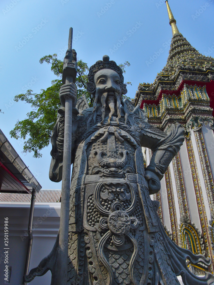 Stone statue  in Wat Phra Chetuphon(Wat Pho) of Thailand.