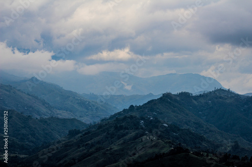 View of green mountains and clouds