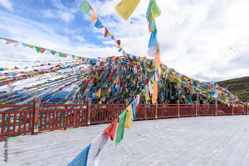 Colorful prayer flags at the Yela Pass in Basu (Baxoi) County, Changdu (Qamdo), Tibet, China. photo