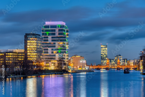 The river Spree in Berlin at night with the Oberbaum Bridge in the back photo