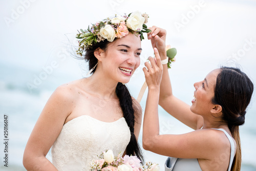 Cheerful bride at the beach photo