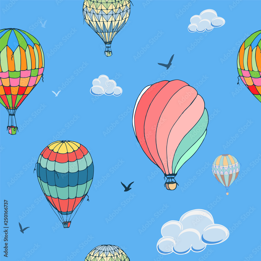Obraz premium Balloons seamless vector pattern on blue background. Many differently colored striped air balloons flying in the clouded sky. Clouds and birds soaring in the sky. Travel and vacation. Wide horizons. 