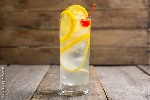 Traditional Tom collins cocktail. Selective focus. Shallow depth of field. photo