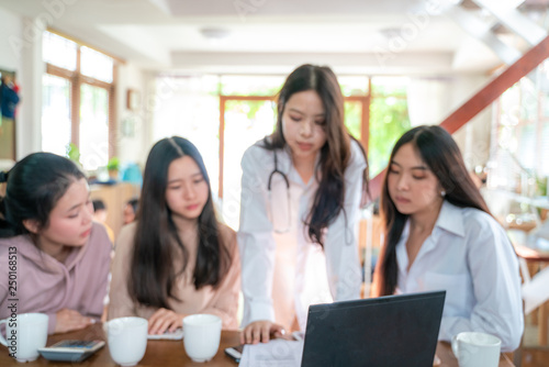 Women healthcare provider doctor talking with business group