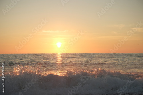 Photo of sunset in sea