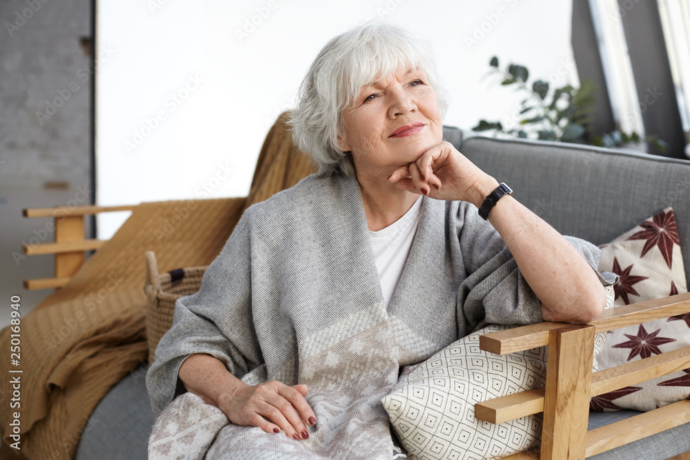 Portrait of a beautiful European middle-aged woman. Fifty-year-old