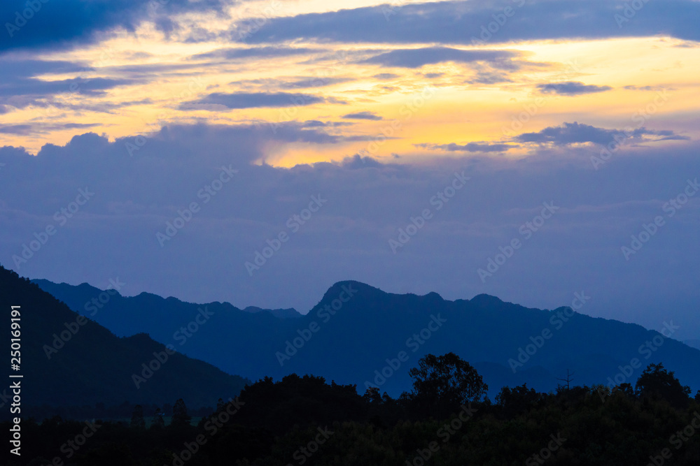 Beautiful  landscape view of hill and  mountain with cloud sky.