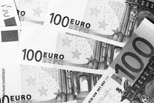 One Hundred euro banknotes as a background close up. Black and white