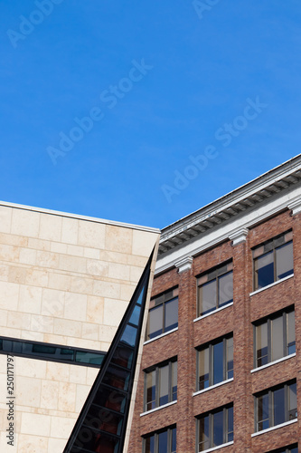 Two buildings in downtown New Westminster: modern vs old