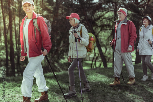 Elderly tourists making one day hike to the natural park