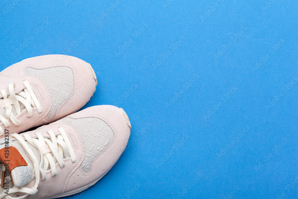 Casual sneakers on blue background Casual sneakers on blue background