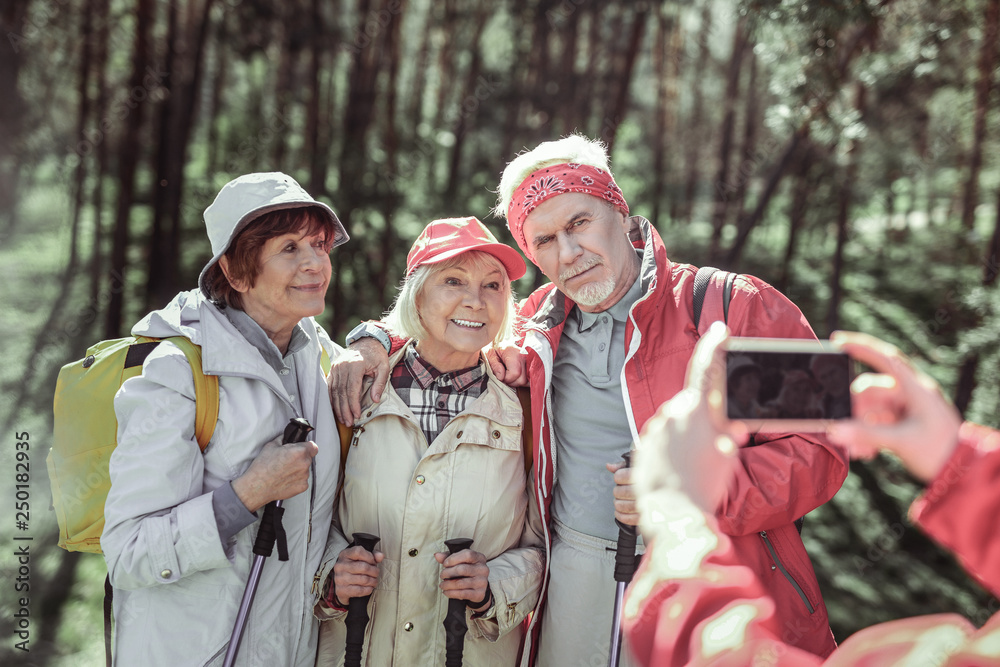Sportive company doing selfie in ecological park Sportive company doing selfie in ecological park
