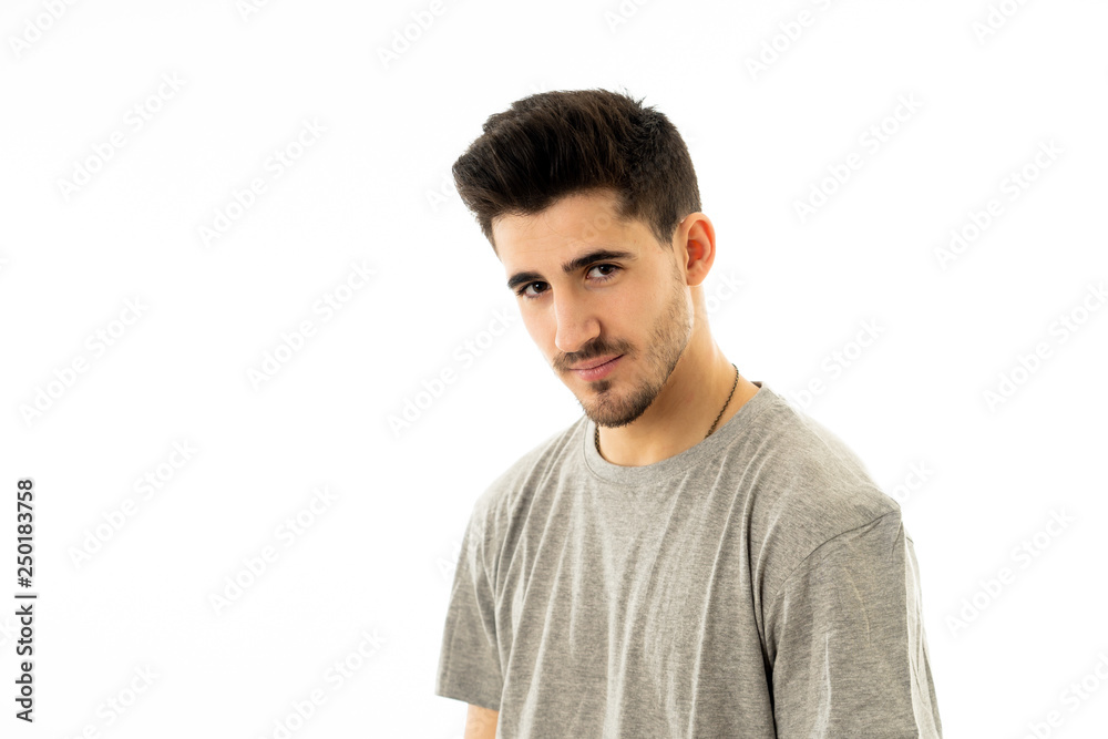 Portrait of handsome young man in neutral poker facial expressions and human emotions Portrait of handsome young man in neutral poker facial expressions and human emotions