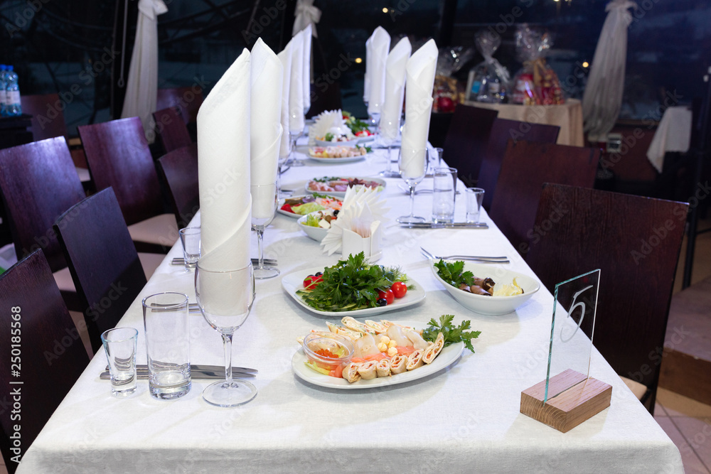 Fototapeta premium Festive table with bright snacks