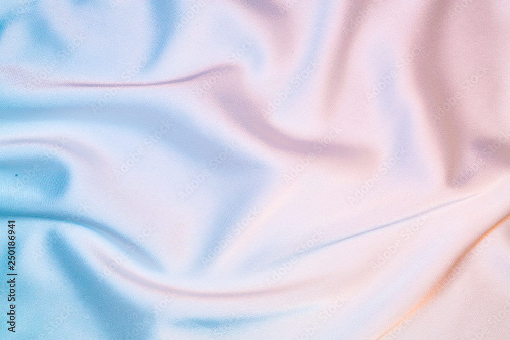 Silk shiny fabric texture in pastel iridescent holographic colors - obrazy, fototapety, plakaty 