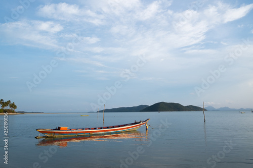 Lonely fishing boat by the sea © kazaalong