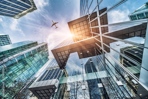 jet plane flying over architecture