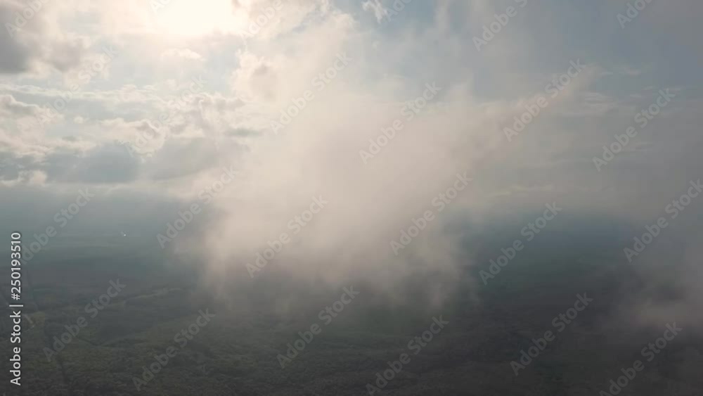 Flying drone in the clouds Flying drone in the clouds