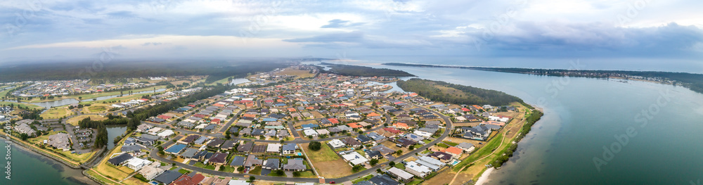 Aerial panorama of Harrington township and Manning River at dusk