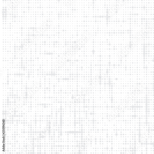  The mosaic of a grey dots on a white background. 