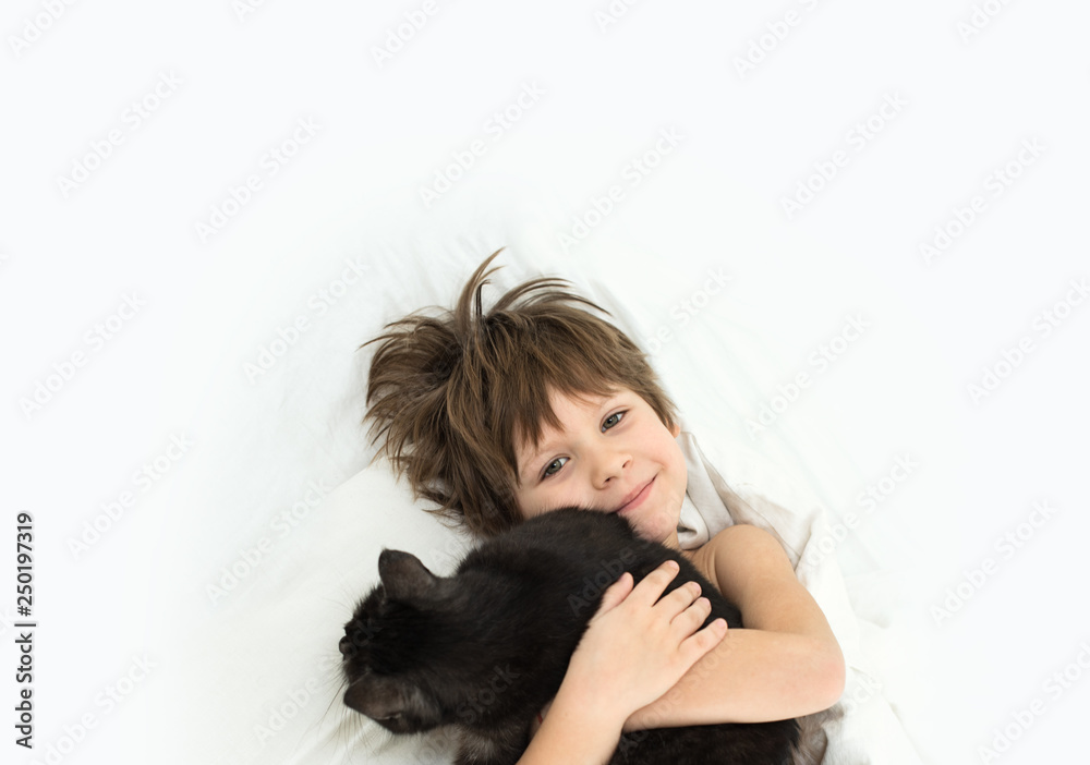 boy with a cat. A child of 6 years without a tooth. boy with a cat. A child of 6 years without a tooth.
