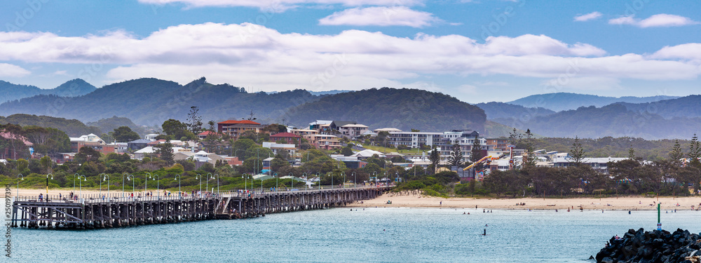 Panoramic landscape of Coffs Harbour jetty and luxury real estate. Coffs Harbour, New South Wales, Australia