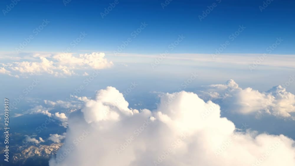 Aerial view above the clouds at sunset Aerial view above the clouds at sunset