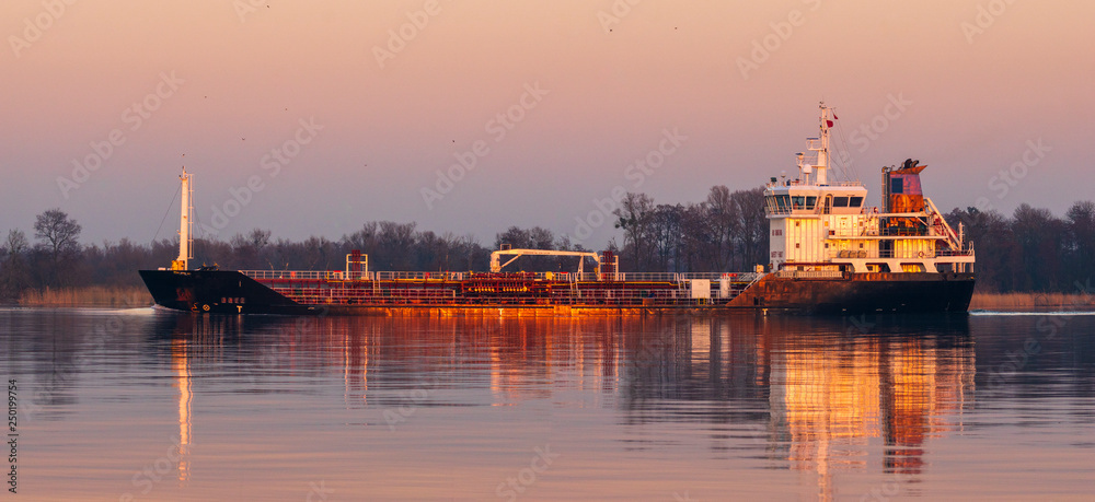 Small oil tanker of the type frequently used for refueling large ships at sea.