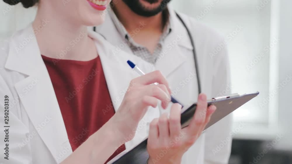 Closeup portrait of nurse and chief physician of modern medical clinic
