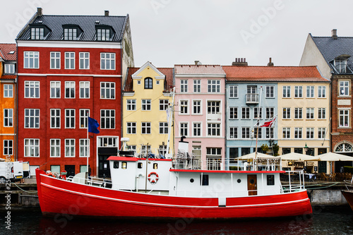 boat and colourful old houses at Nyhavn harbour  Copenhagen