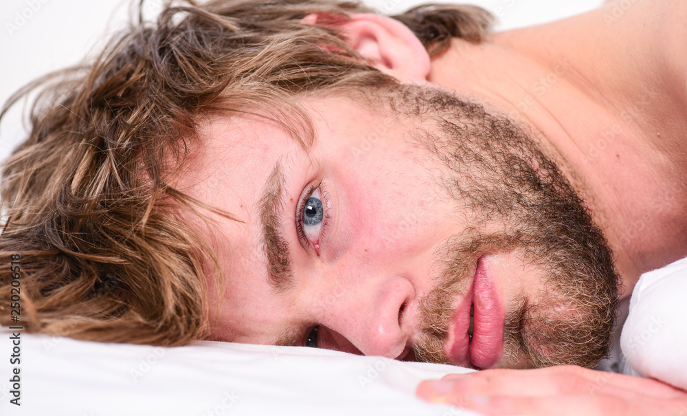 Simple tips to improve your sleep. Total relax concept. Man unshaven bearded face sleep relax or just wake up. Guy bearded macho relax in morning. Man attractive macho relax and feel comfortable Simple tips to improve your sleep. Total relax concept. Man unshaven bearded face sleep relax or just wake up. Guy bearded macho relax in morning. Man attractive macho relax and feel comfortable